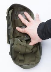 Blackhawk Medical Pouch, green, surplus. Wide elastics towards the body and double-layered elastics on the lid.